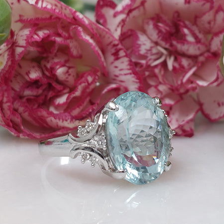8.58ct Oval Aquamarine Solitaire Ring with Decorative Diamond Shoulders
