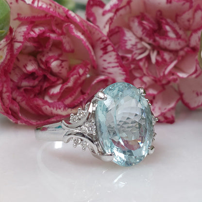 8.58ct Oval Aquamarine Solitaire Ring with Decorative Diamond Shoulders