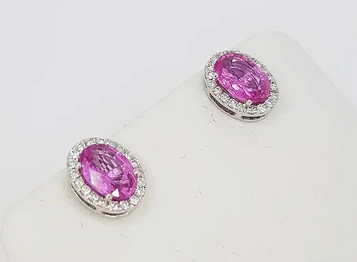 2.87ct Pink Sapphire and Diamond Oval Cluster Stud Earrings; oval faceted pink sapphires, surrounded by diamonds, in 18ct white gold