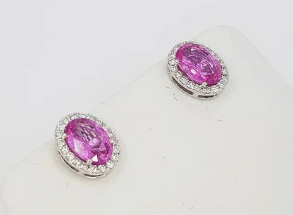 2.87ct Pink Sapphire and Diamond Oval Cluster Stud Earrings; oval faceted pink sapphires, surrounded by diamonds, in 18ct white gold