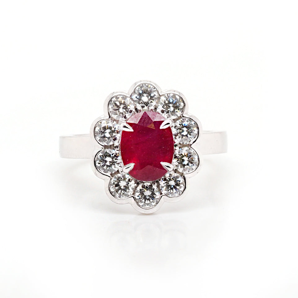 Ruby and diamond cluster ring in platinum.