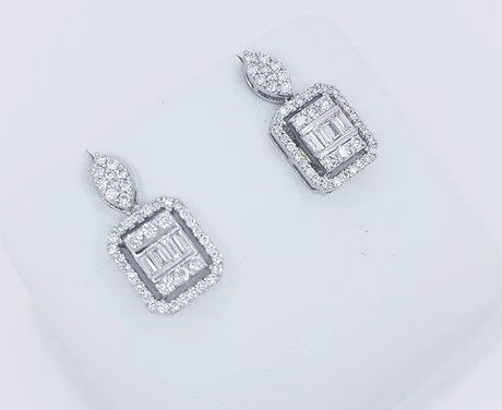 Square Shaped Diamond Cluster Drop Earrings; baguette and brilliant cut diamond set cluster suspended from a marquise shaped diamond set stud, in 18ct white gold.