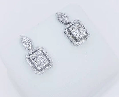 Square Shaped Diamond Cluster Drop Earrings; baguette and brilliant cut diamond set cluster suspended from a marquise shaped diamond set stud, in 18ct white gold.