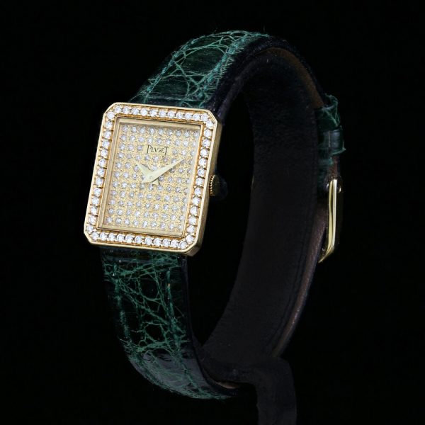 Piaget Ladies Custom Diamond Dial and Bezel 18ct Gold Manual 20" Watch; Model Number 41545, with original box and service document, Circa 1990s