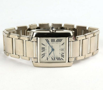 Cartier Gents Tank Française 18ct White Gold 28mm Automatic Rectangular Watch, silver guilloche dial, black Roman numerals, date aperture at 6, sapphire crystal glass, cabochon blue gem set crown, on Cartier 18ct bracelet with hidden double deployment clasp. With Cartier booklet and certificate dated 2006.