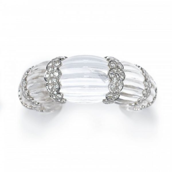 Rock Crystal and Diamond Cuff Bangle Bracelet; modern fluted rock crystal bangle bracelet carved from one single piece of rock crystal, with eight scalloped 18ct white gold sections set with 7.00 carats round brilliant-cut diamonds