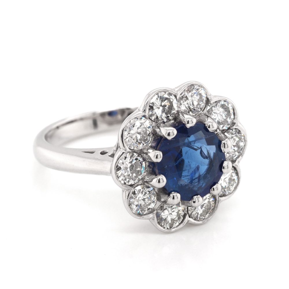 Sapphire and diamond cluster ring in white gold.