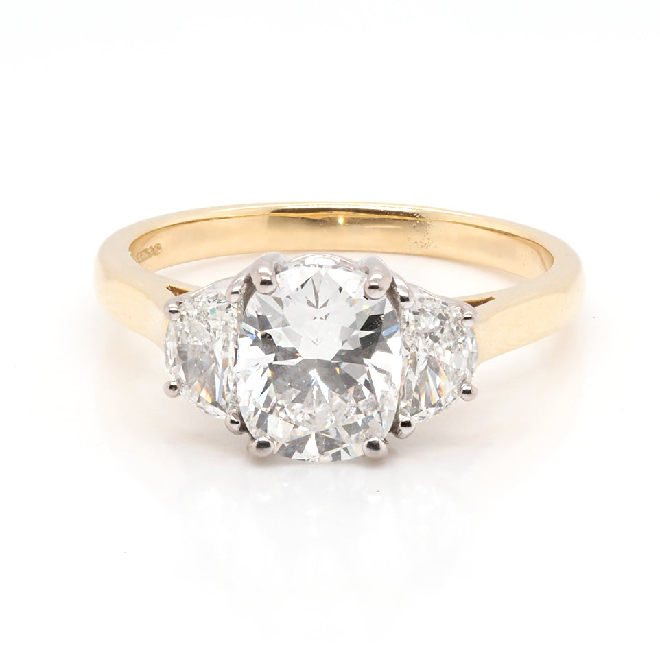 Three Stone 2.58 Carat Diamond Ring In Platinum and 18 Carat Yellow Gold