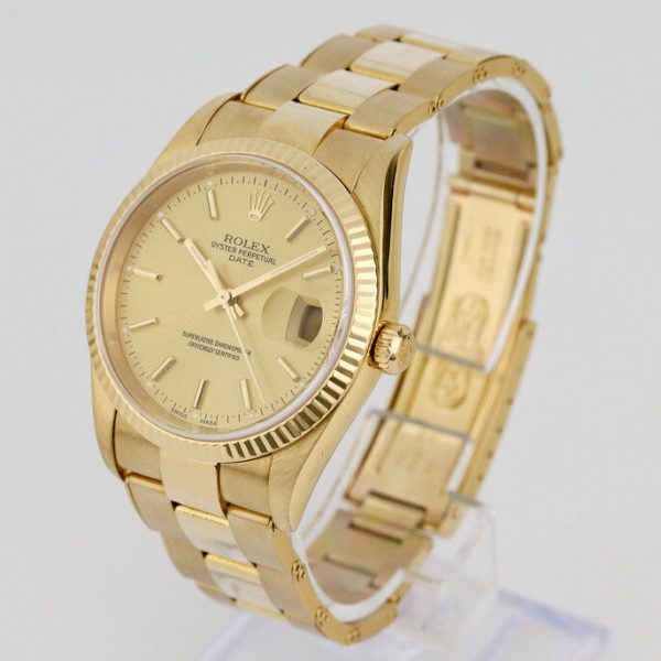 Rolex Oyster Perpetual Date 18ct Yellow Gold 34mm Automatic, Ref 15238, from 2000-2001, champagne dial, date indicator, yellow gold bezel, sapphire crystal and screw-locked crown, on an 18ct yellow gold Oyster bracelet with fold-over clasp, with Rolex box