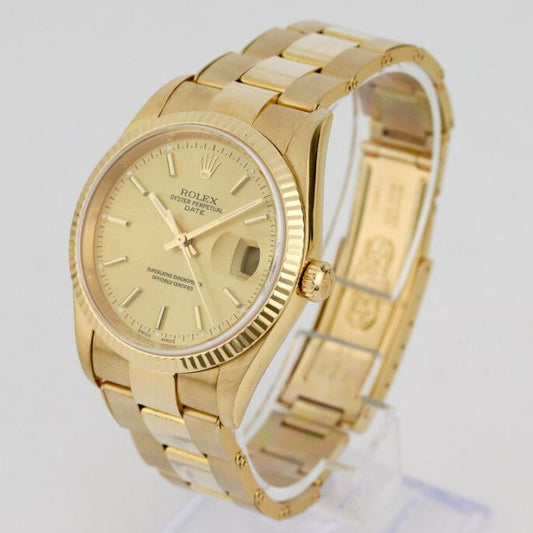 Rolex Oyster Perpetual Date 18ct Yellow Gold 34mm Automatic, Ref 15238, from 2000-2001, champagne dial, date indicator, yellow gold bezel, sapphire crystal and screw-locked crown, on an 18ct yellow gold Oyster bracelet with fold-over clasp, with Rolex box