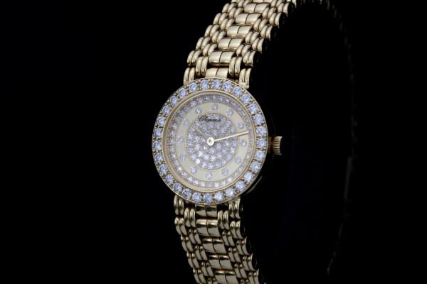 Chopard Ladies 18ct Yellow Gold Diamond Set Watch; diamond pavé-set face, bezel and hour markers, Quartz movement, 18ct gold Chopard link bracelet and clasp, Signed, with original box