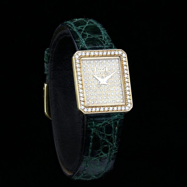Piaget Ladies Custom Diamond Dial and Bezel 18ct Gold Manual 20" Watch; Model Number 41545, with original box and service document, Circa 1990s
