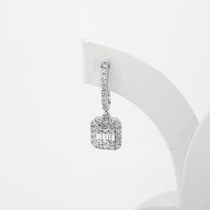 Baguette Cut Diamond Cluster Drop Earrings; baguette-cut diamond clusters, surrounded by diamond halos, and suspended from diamond set drops, 0.66 carat total, in 18ct white gold
