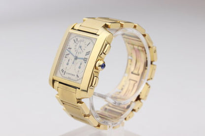 Cartier Tank Francaise 18ct Yellow Gold 1830 Chronograph, white dial, blue steel hands, Roman numerals, sapphire cabochon crown, sapphire crystal, 18ct yellow gold bracelet with double fold clasp, with Cartier box.