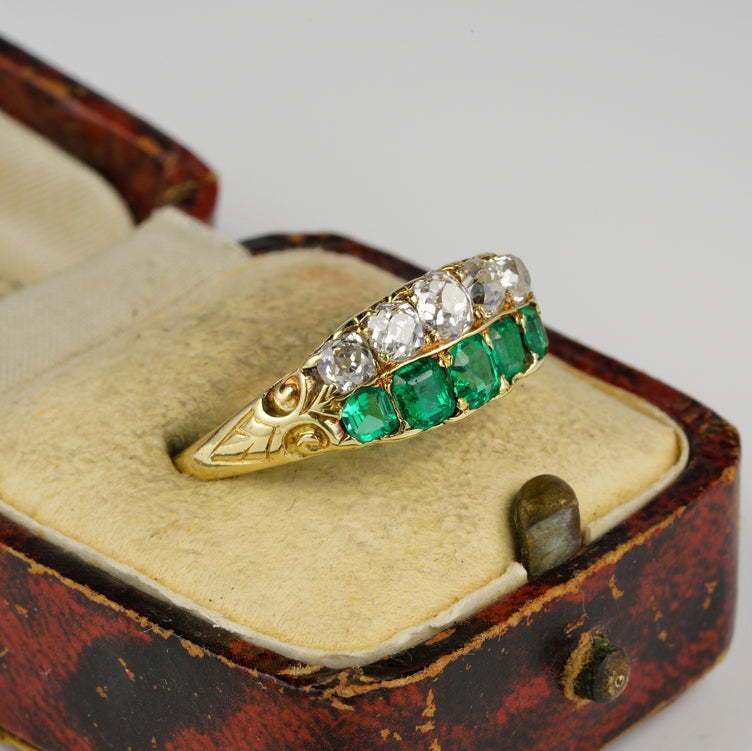 Antique Victorian Colombian Emerald and Old Mine Cut Diamond Double Row Five Stone Ring, Late 19th century, Circa 1870