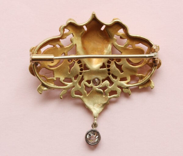 Antique Edwardian Diamond Set 18ct Yellow Gold Neo Renaissance Brooch; openwork Mascaron, scroll, foliate and floral design, Circa 1890.
