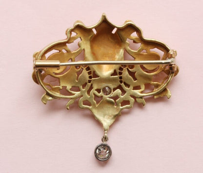 Antique Edwardian Diamond Set 18ct Yellow Gold Neo Renaissance Brooch; openwork Mascaron, scroll, foliate and floral design, Circa 1890.