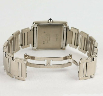 Cartier Gents Tank Française 18ct White Gold 28mm Automatic Rectangular Watch, silver guilloche dial, black Roman numerals, date aperture at 6, sapphire crystal glass, cabochon blue gem set crown, on Cartier 18ct bracelet with hidden double deployment clasp. With Cartier booklet and certificate dated 2006.