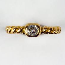 Old Cut Diamond Solitaire 18ct Gold Twisted Pinky Ring; 0.45 carat old mine-cut diamond collet set on a twisted 18ct yellow gold shank