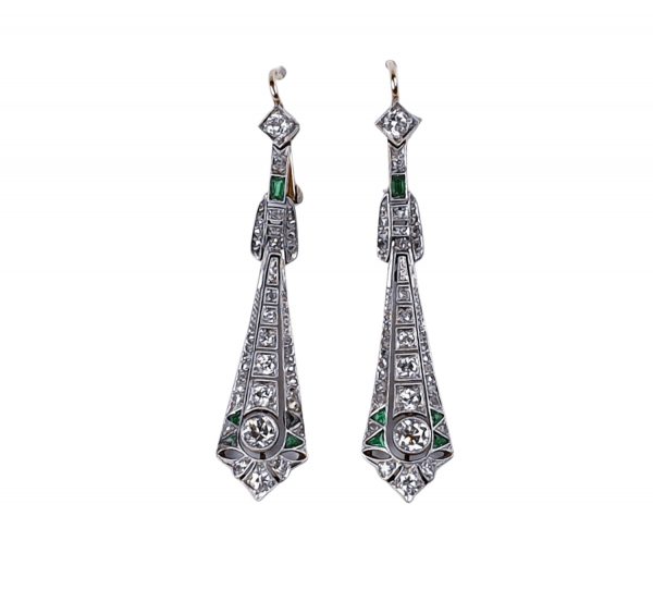 Antique Edwardian Emerald and Diamond Drop Earrings; sophisticated pair of diamond drop earrings with a hint of emerald, 1.00 carat total, in platinum and 18ct yellow gold. Circa 1900