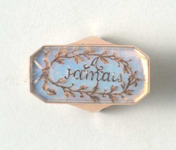 18th Century French Opaline and Gold Panel Ring; octagonal ring set with opaline (opalescent glass panel) and the text ‘A Jamais’ which means 'forever'