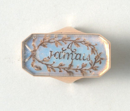 18th Century French Opaline and Gold Panel Ring; octagonal ring set with opaline (opalescent glass panel) and the text ‘A Jamais’ which means 'forever'