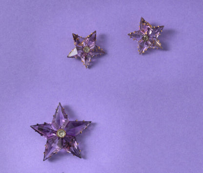 Antique Victorian Amethyst and Diamond Star Pendant/Brooch and Earrings Suite; set with high kite shaped amethysts and a rose cut diamond in the centre.