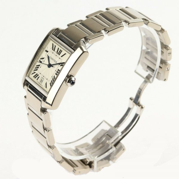 Cartier Gents Tank Française 18ct White Gold 28mm Automatic Rectangular Watch, silver guilloche dial, black Roman numerals, date aperture at 6, sapphire crystal glass, cabochon blue gem set crown, on Cartier 18ct bracelet with hidden double deployment clasp. With Cartier booklet and certificate dated 2006.