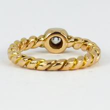 Old Cut Diamond Solitaire 18ct Gold Twisted Pinky Ring; 0.45 carat old mine-cut diamond collet set on a twisted 18ct yellow gold shank
