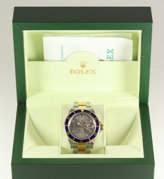 Rolex Submariner Date 16613 Serti Dial Steel and Gold Automatic 40mm Wristwatch Slate Serti factory dial - 8 diamond and 4 sapphire hour markers, steel and gold Oyster bracelet with fold-over clasp, with gold through the buckle, with Box and Papers
