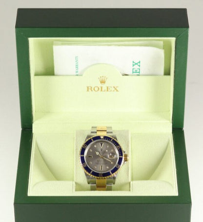 Rolex Submariner Date 16613 Serti Dial Steel and Gold Automatic 40mm Wristwatch Slate Serti factory dial - 8 diamond and 4 sapphire hour markers, steel and gold Oyster bracelet with fold-over clasp, with gold through the buckle, with Box and Papers