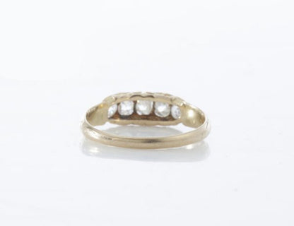Antique Victorian Old Cut Diamond Five Stone Ring; set with five graduating old-cut diamonds, in 15ct yellow gold. Made in England, Circa 1860s