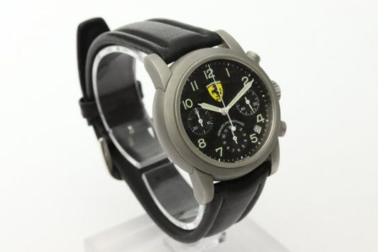 Girard Perregaux Ferrari 8020 Matt Steel and Carbon Fibre 38mm Automatic Chronograph Gents Watch; 38mm matt steel case with black carbon fibre dial, chronograph and date functions with sapphire crystal, on an off-brand black leather strap.