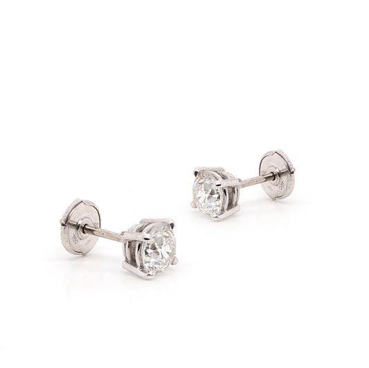 Old cut diamond stud earrings in gold.