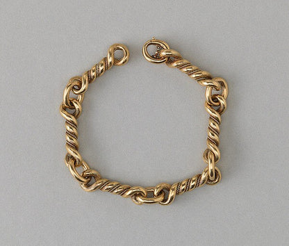 Vintage Hermes Gold Knot Bracelet; comprised of six 18ct yellow gold knotted links. Signed Hermès, Paris, Circa 1970