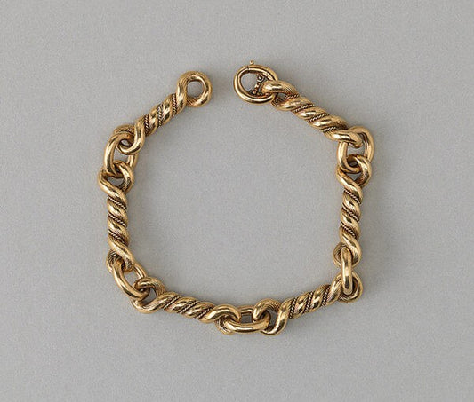 Vintage Hermes Gold Knot Bracelet; comprised of six 18ct yellow gold knotted links. Signed Hermès, Paris, Circa 1970