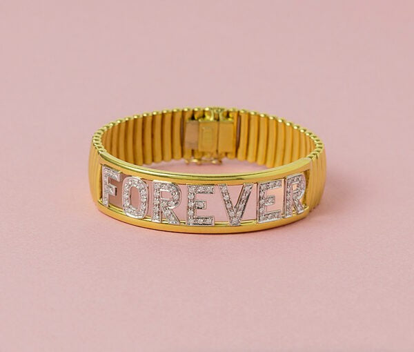 Vintage Italian 18ct Yellow Gold Forever Bracelet with Diamonds; the word FOREVER prominently set with 73 brilliant cut diamonds totalling 1.00 carat, Circa 1990