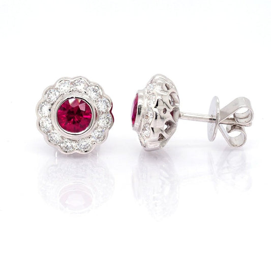 Ruby and diamond cluster earrings in white gold.