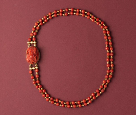 Vintage Jacob de Groes Coral Bead and Cameo Necklace; 18ct yellow gold double string of alternated bright red coral and gold beads, cameo set lock, c.1980.