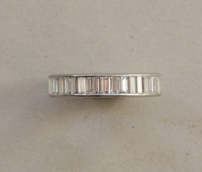 Vintage 3.08 carat Baguette Cut Diamond and Platinum Full Eternity Band Ring; set with baguette-cut diamonds, vertically set, Circa 1950, Numbered: CJ 551.