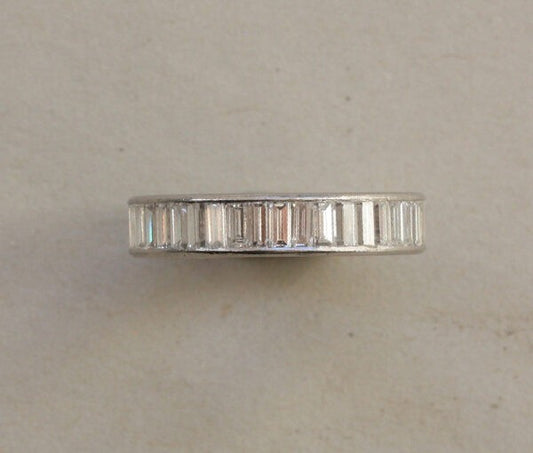 Vintage 3.08 carat Baguette Cut Diamond and Platinum Full Eternity Band Ring; set with baguette-cut diamonds, vertically set, Circa 1950, Numbered: CJ 551.