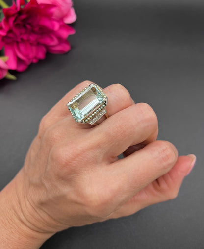 An aquamarine, pearl and diamond large cocktail ring in yellow gold and platinum, modelled on a hand