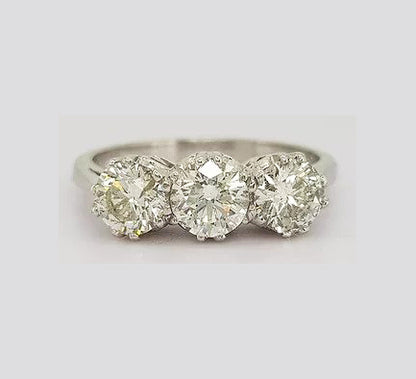 Diamond Three Stone Ring; classic trilogy ring, three brilliant cut diamonds, 1.60 carat total, in 18ct white gold. Diamond colour H/I, clarity SI1.