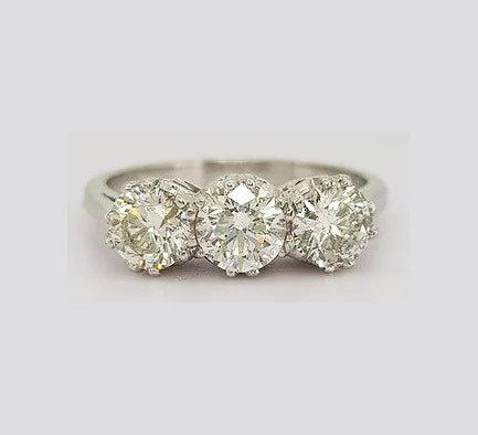 Diamond Three Stone Ring; classic trilogy ring, three brilliant cut diamonds, 1.60 carat total, in 18ct white gold. Diamond colour H/I, clarity SI1.
