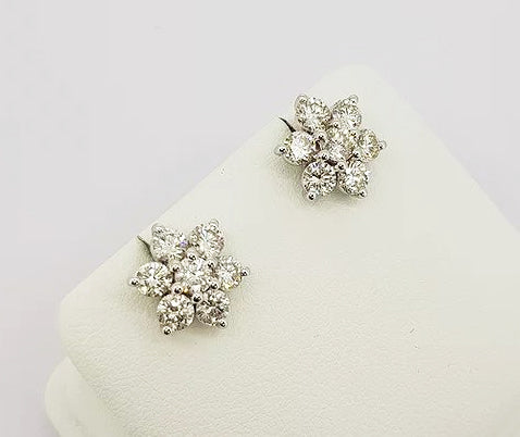 Diamond Floral Cluster Stud Earrings; central brilliant-cut diamond surrounded by six diamond petals, 2.00 carats, claw set, 18ct white gold