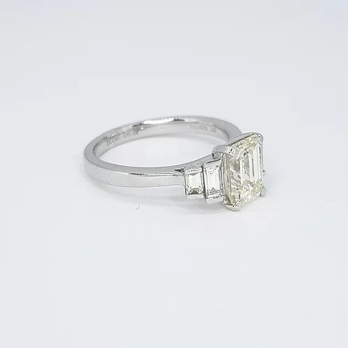 1.54ct Emerald Cut Diamond and Platinum Engagement Ring, with 0.43cts graduated baguette cut diamond set shoulders