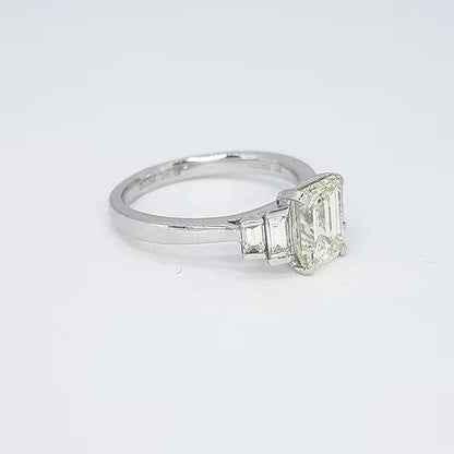 1.54ct Emerald Cut Diamond and Platinum Engagement Ring, with 0.43cts graduated baguette cut diamond set shoulders