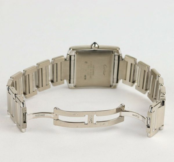 Cartier Gents Tank Française 18ct White Gold 28mm Automatic Rectangular Watch, silver guilloche dial, black Roman numerals, date aperture at 6, sapphire crystal glass, cabochon blue gem set crown, on Cartier 18ct bracelet with hidden double deployment clasp. With Cartier booklet and certificate dated 2006.