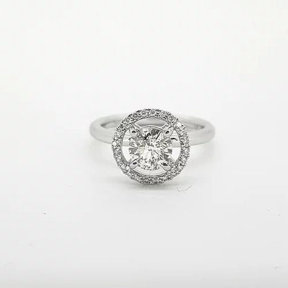 1.30ct Diamond Halo Cluster Ring; central 1.30 carat round brilliant-cut diamond, four-claw set and surrounded by a fixed diamond set mount, in 18ct white gold