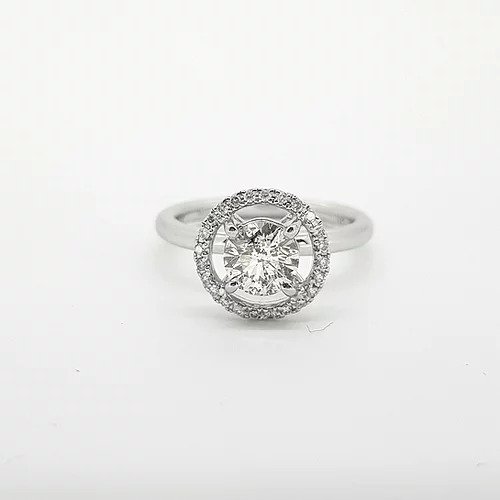 1.30ct Diamond Halo Cluster Ring; central 1.30 carat round brilliant-cut diamond, four-claw set and surrounded by a fixed diamond set mount, in 18ct white gold